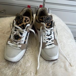 Michael Kors exquisite wedge sneakers.